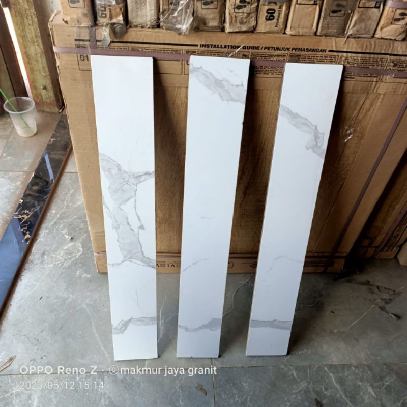Plint granit 10x60 putih motip Daiva white