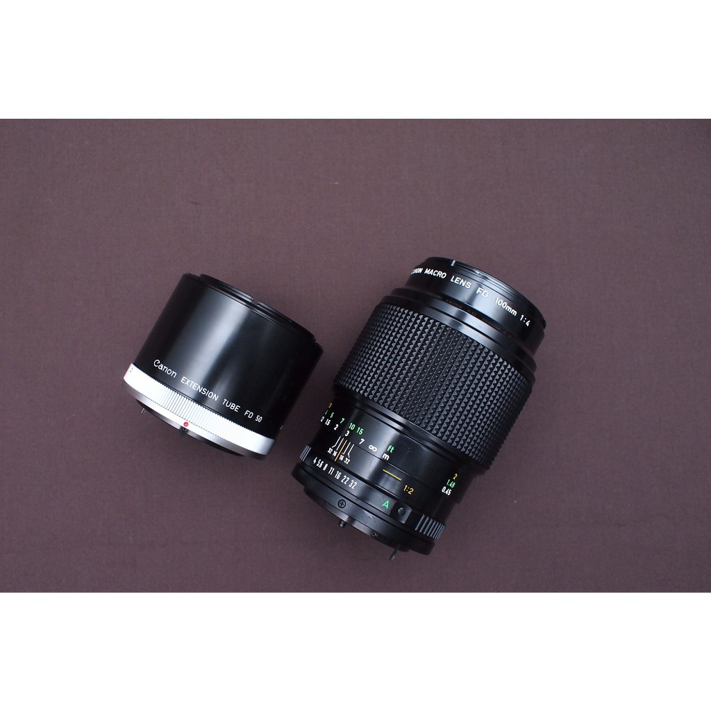 Lensa Manual Macro Canon New FD 100mm f4 Plus Extention Macro