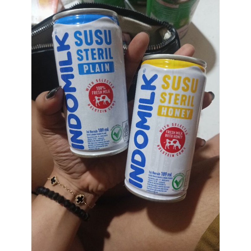 

Indomilk Susu Steril Madu Dan Plain 189ml