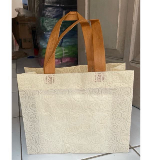 

Goddie bag spunbond KECIL 222710 teksture alas 27x10