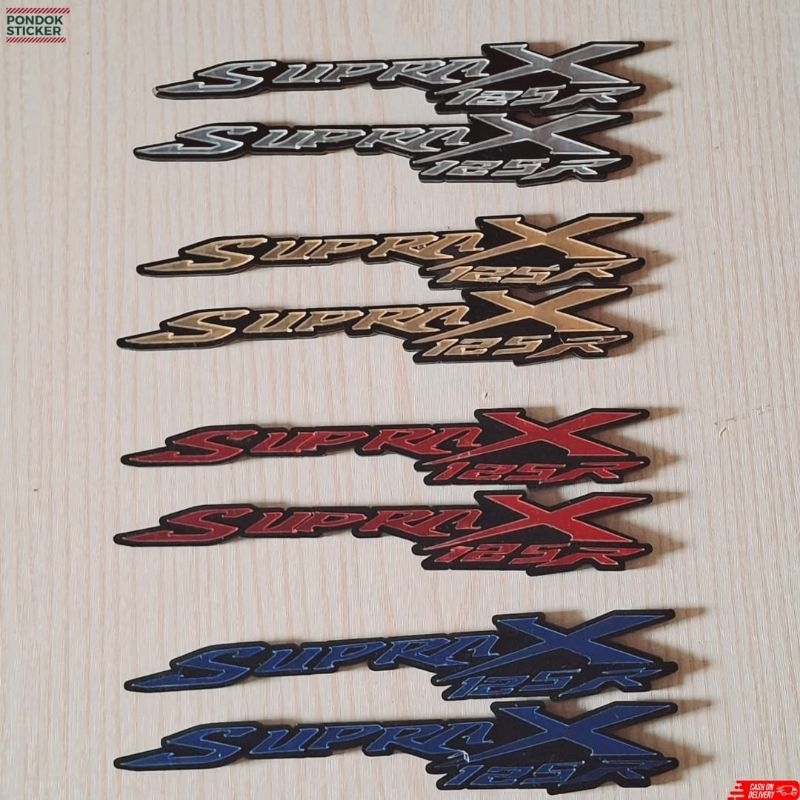 Emblem motor timbul akrilik tulisan Supra X 125 sepasang