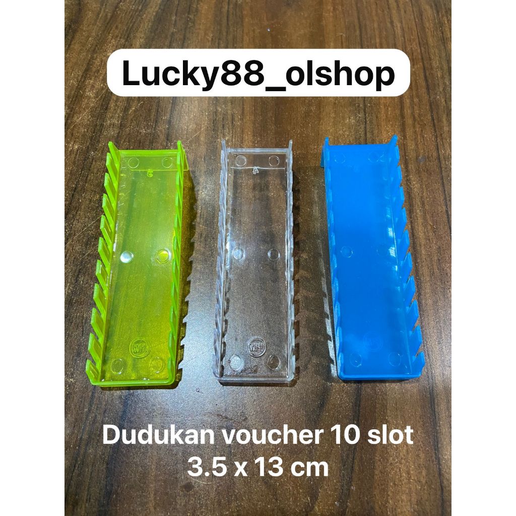 

TEMPAT DUDUKAN VOUCHER AKRILIK 3.5 X 13 CM BENING 10 SLOT