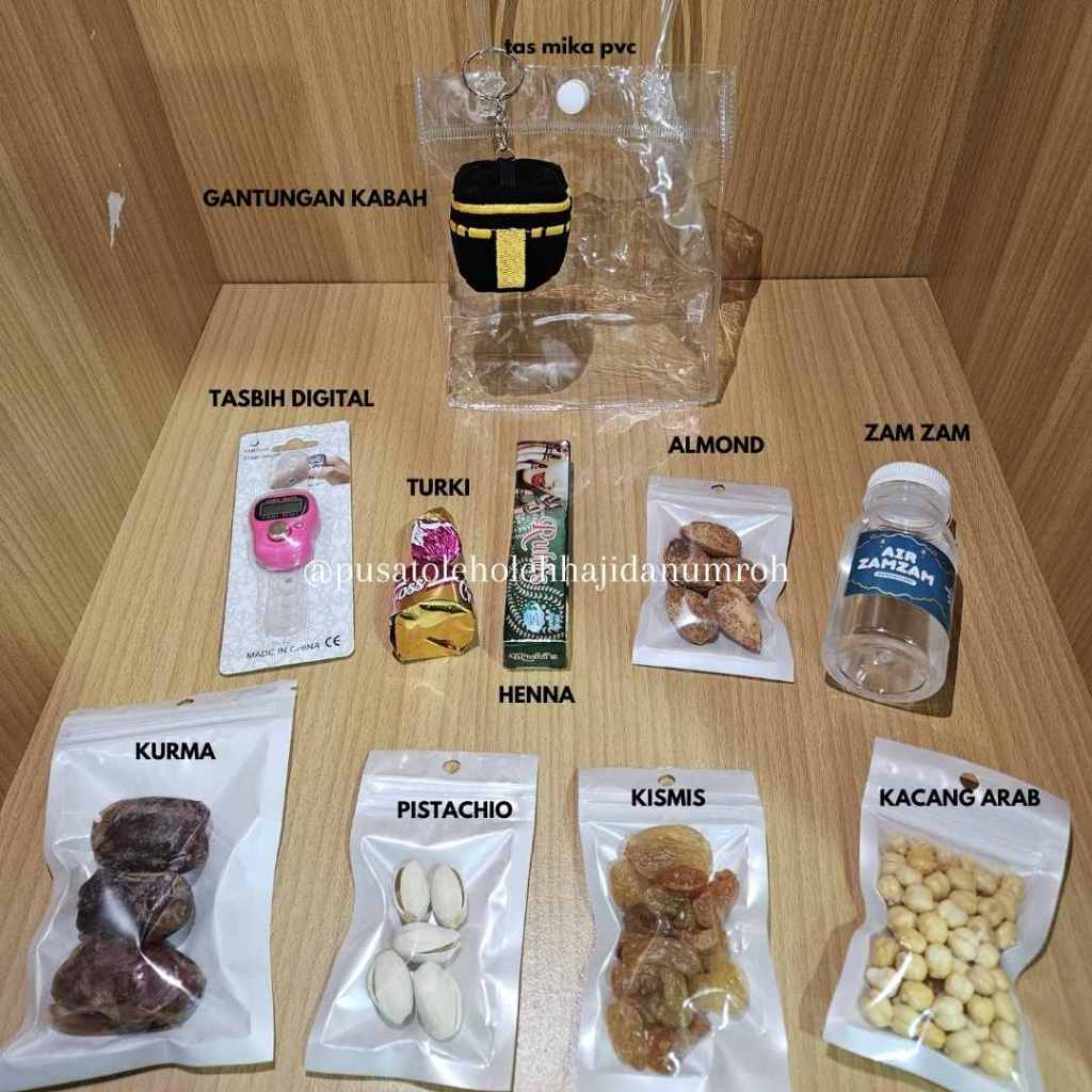

Paket oleh oleh Haji Dan Umroh Eksklusif Tas Goodie Bag Totebag Transparan 4 series Gantungan Kunci Unta dan Kabah