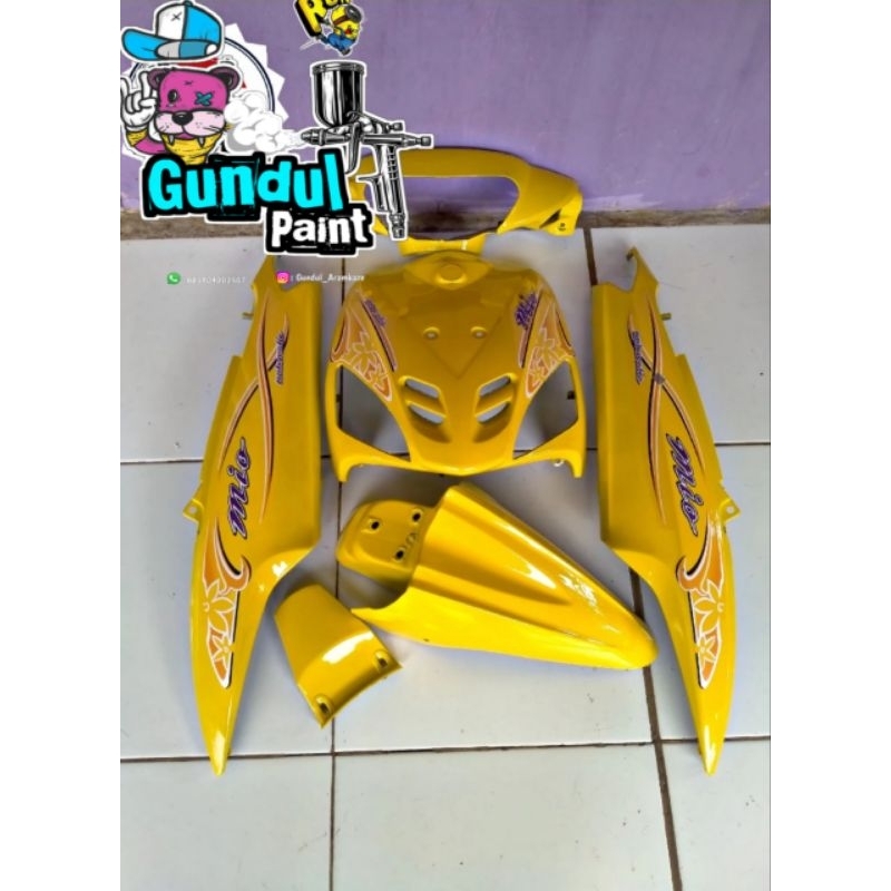 Cover ful body halus mio sporty kuning plus striping bunga