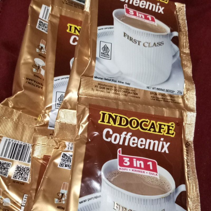

Indocafe Coffeemix Kopi + krimer + Gula