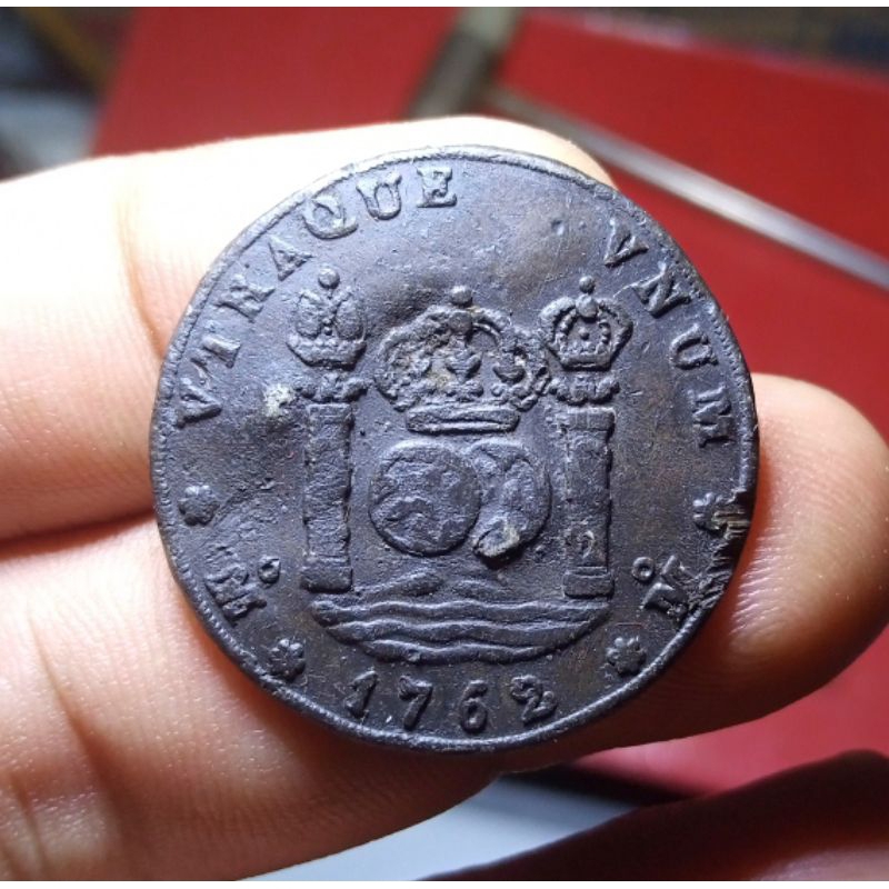 Koin Timah Motif Bola DuniaTemuan Sungai