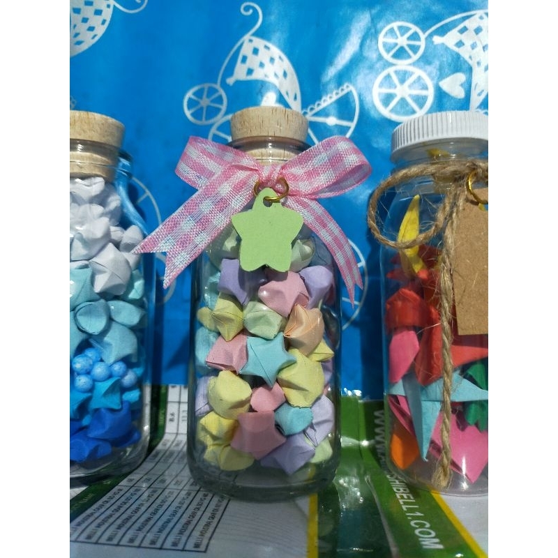

Origami bintang warna mix pastel dalam botol 100 ml / lucky star /edisi valentine / lucky star in bottle / origami bintang dalam botol