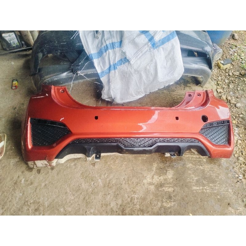 bemper belakang sirion 2015-2016 original