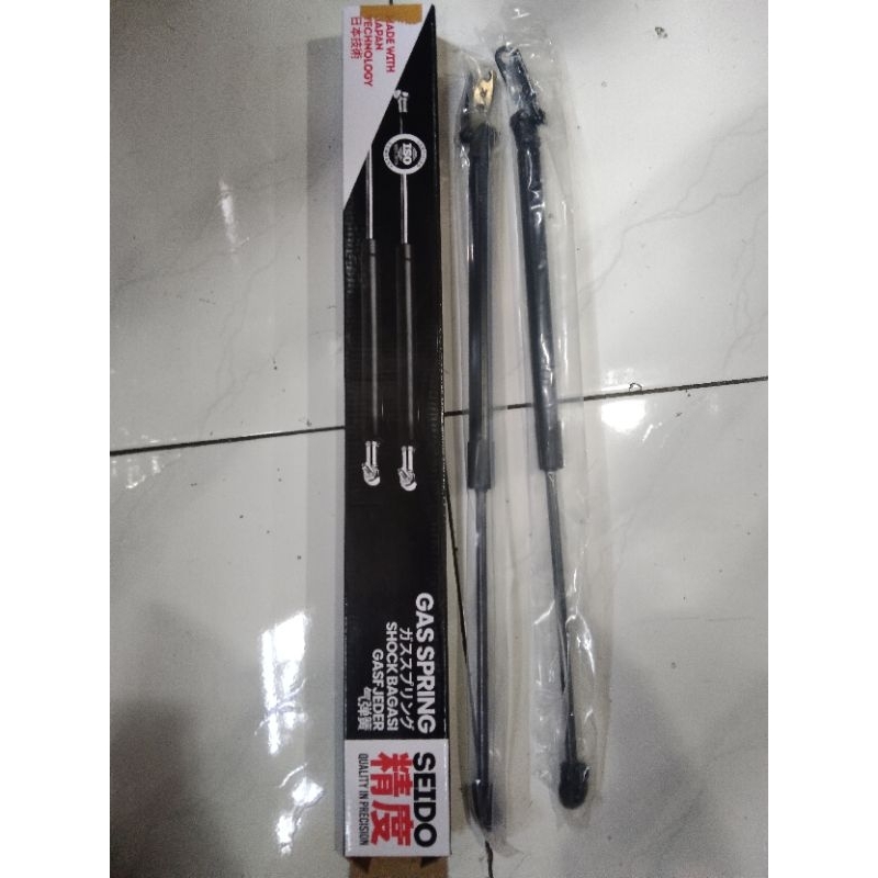 Shock bagasi Nissan March