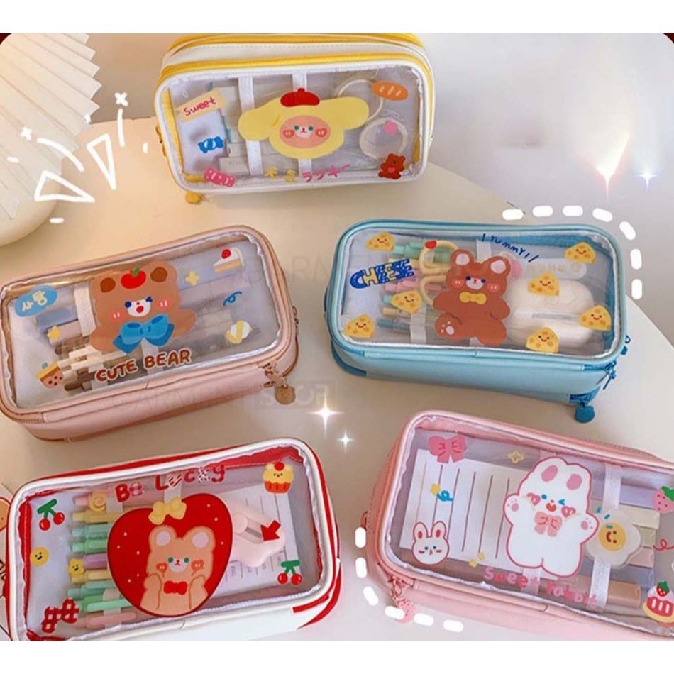 

Tempat Pensil Lucu Anak Transparan Kotak Pencil Dompet Besar Karakter Motif Pouch Stationary Resleting Serbaguna