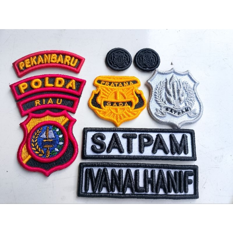 bordir 1 set satpam Polda Riau /pekanbaru timbul