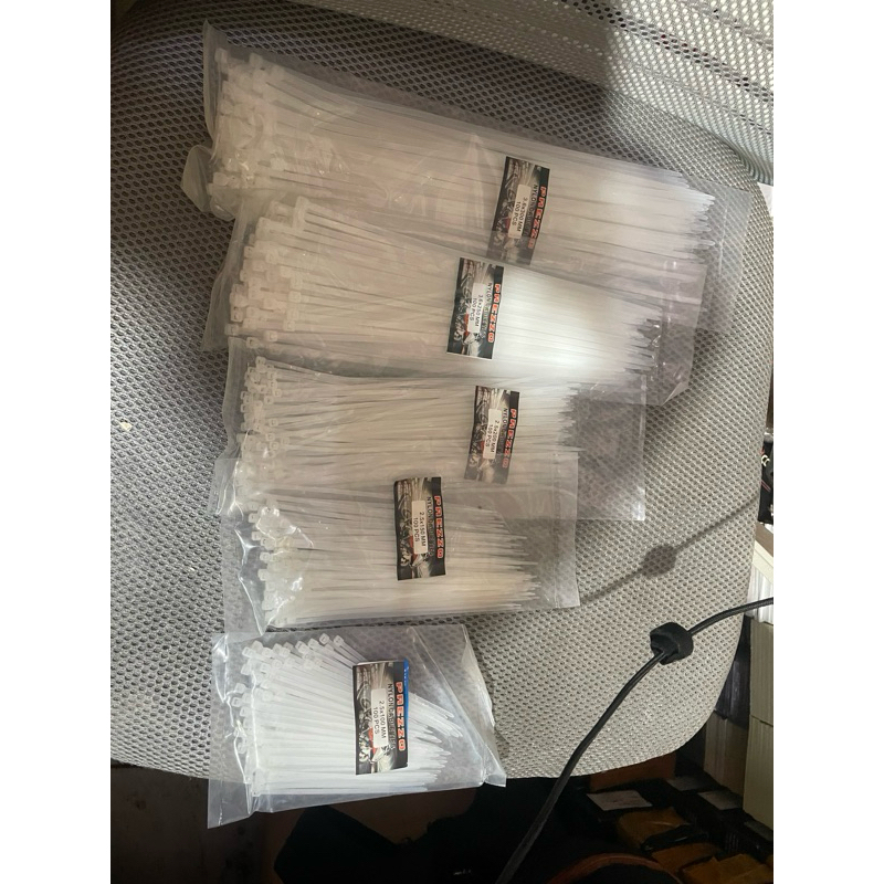 

cable tis/cabel lock serba guna warna putih 1bungkus isi 100pcs/bungkus bahan nylon