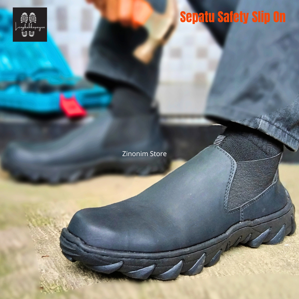 Sepatu Ujung Besi Pria Safety Shoes Hitam Slip On Tanpa Tali