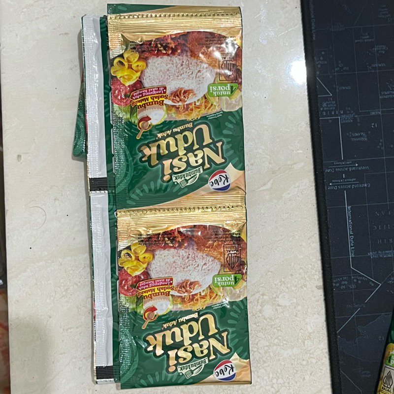 

MURAH BUMBU NASI UDUK INSTANT 1 RENCENG ISI 10