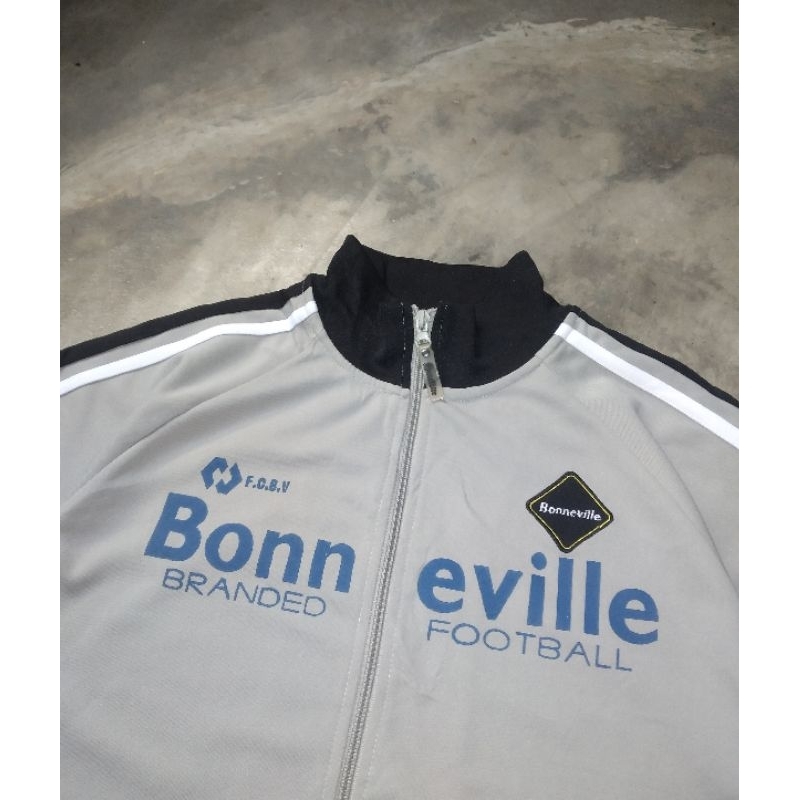 tracktop lengan pendek