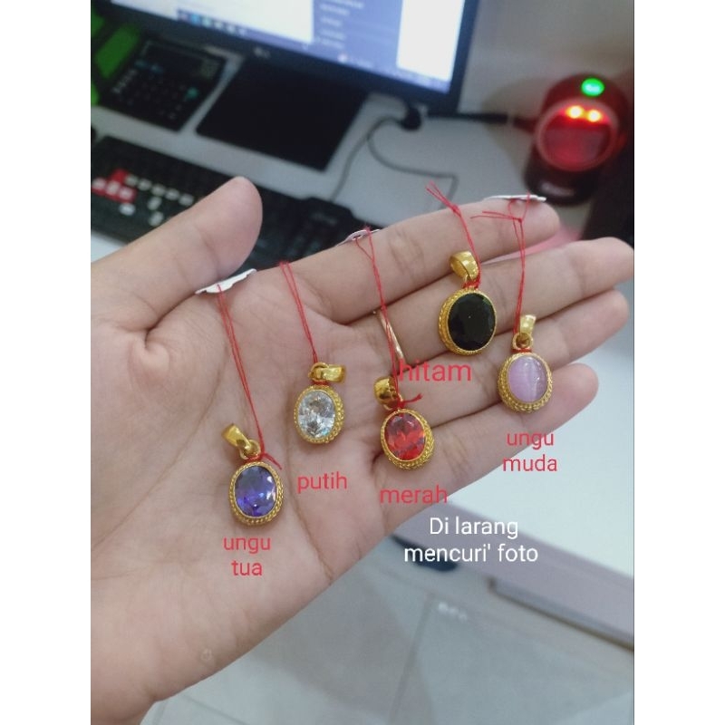 liontin batu titanium bulet