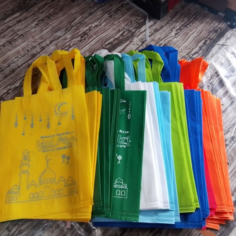 

(12 PCS) EDISI LEBARAN 30X40 MOTIF WARNA MIX