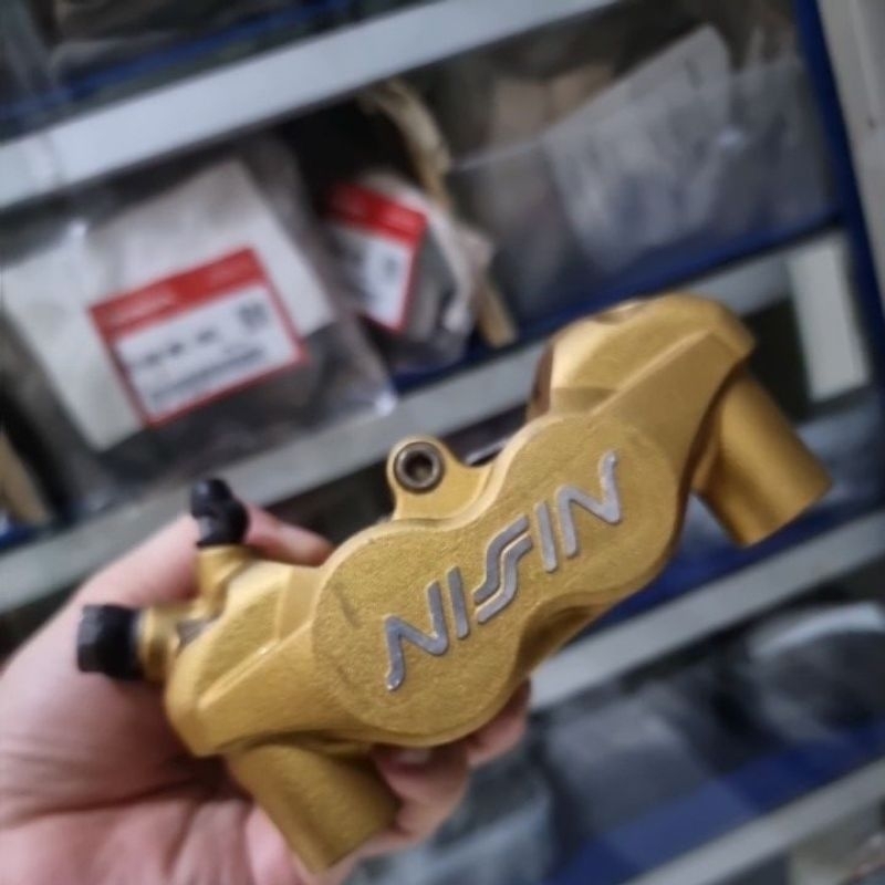 kaliper depan kiri radial 108 mm 4 piston Nissin