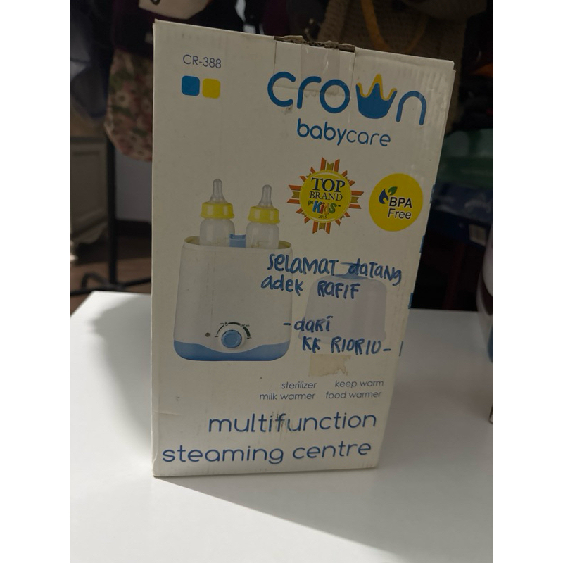 Penghangat susu dan steril botol susu Crown Baby