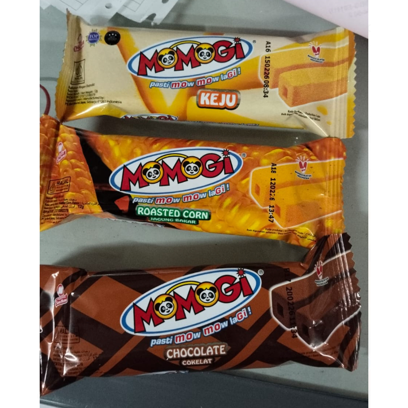 

JUAL PER 10 BUNGKUS - Snack MOMOGI 12gr - Roasted Corn / Chocolate / Keju