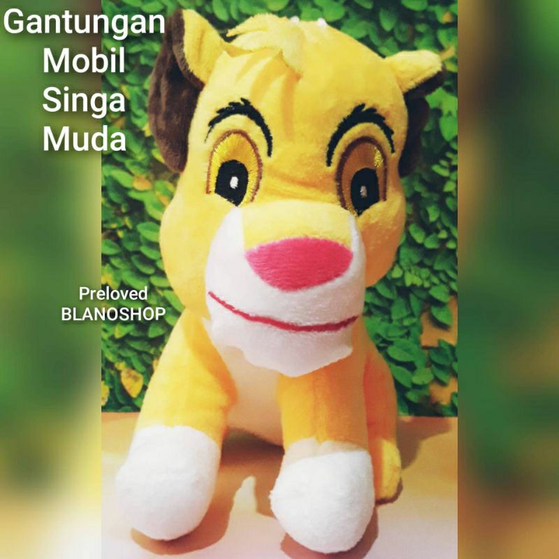 Preloved Boneka Gantungan Mobil Singa Muda Kuning