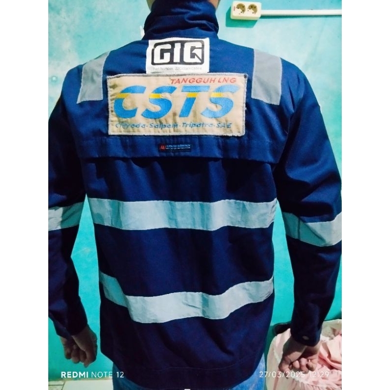 baju kerja LNG tangguh divisi CSTS papua