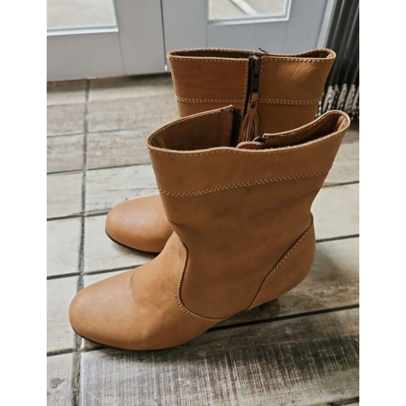 leather boots by niluh djelantik