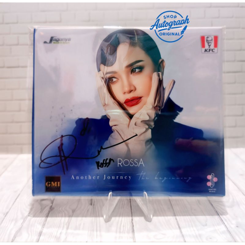 CD original rossa beserta tanda tangan asli