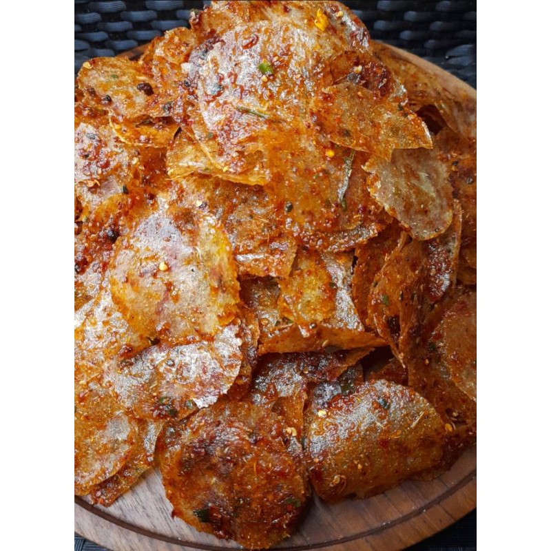 

KERIPIK KACA (KRIPCA) BULAT TIPIS PEDAS DAUN JERUK