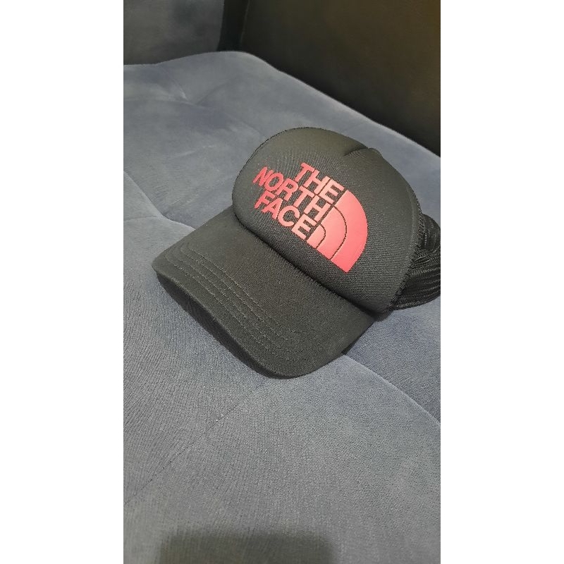 topi tnf