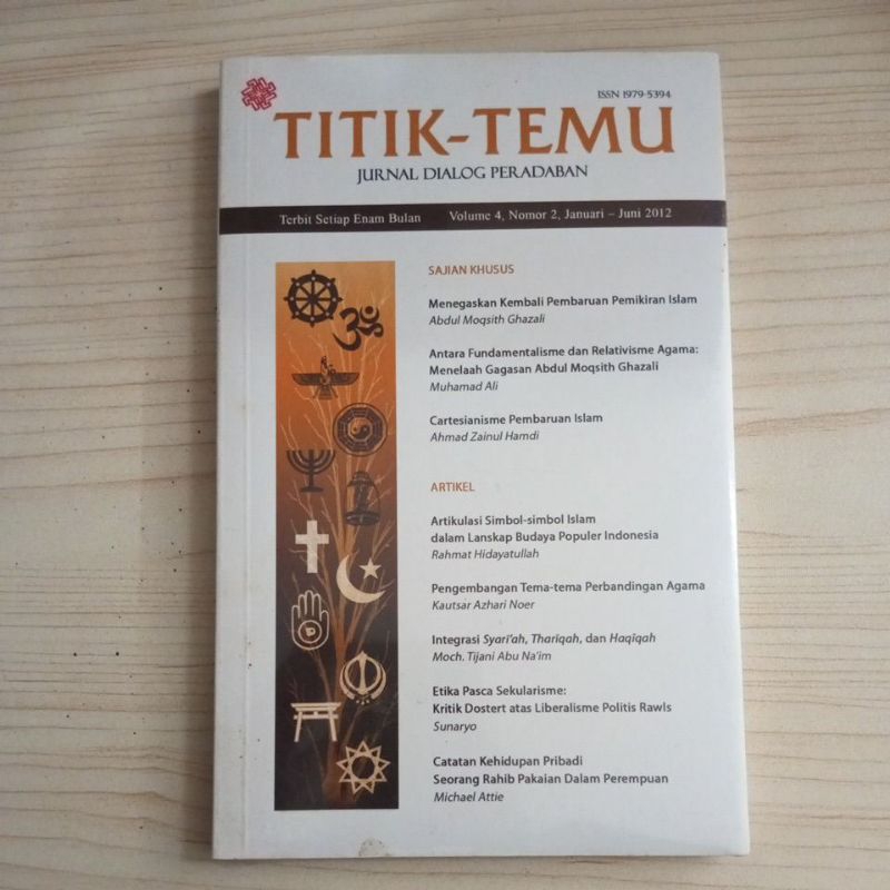 BUKU TITIK TEMU JURNAL DIALOG PERADABAN VOLUME 4 NOMOR 2 2012 SEGEL
