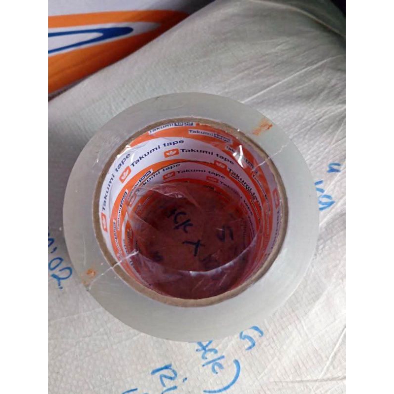 

lakban bening merek takumi 45mm x 90 yard