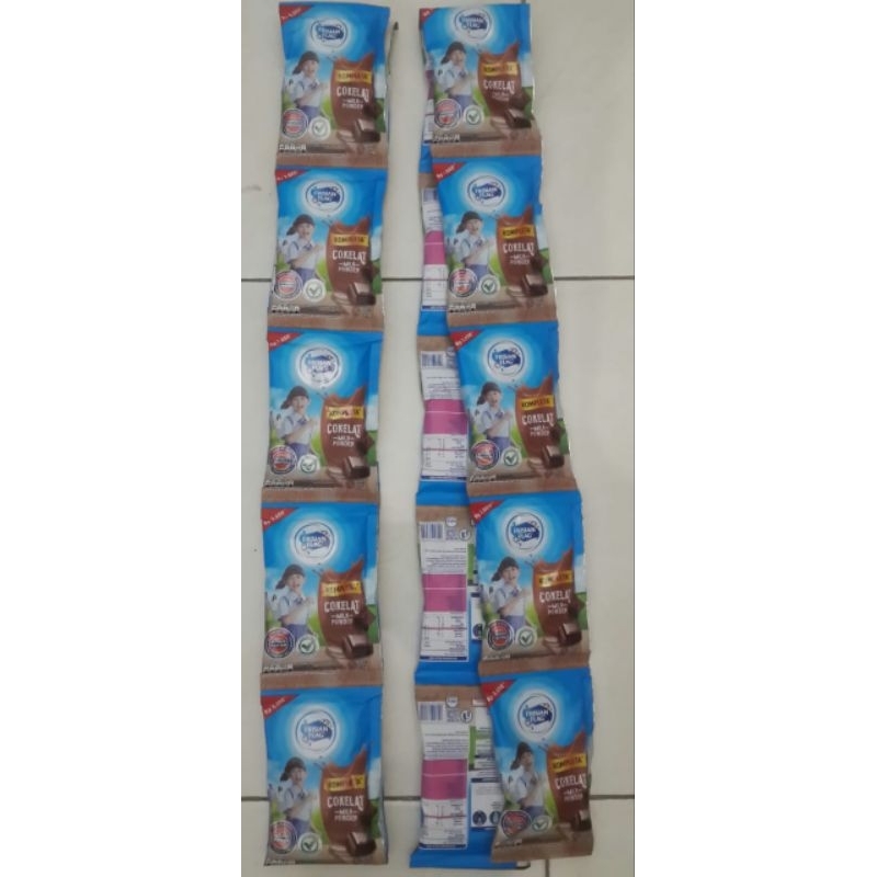 

Susu Bubuk Instan Coklat FRISIAN FLAG KOMPLETA Sachet 35 Gr ( 1 Renteng 10 Sachet )