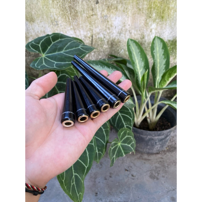 once kayu kelor hitam motif