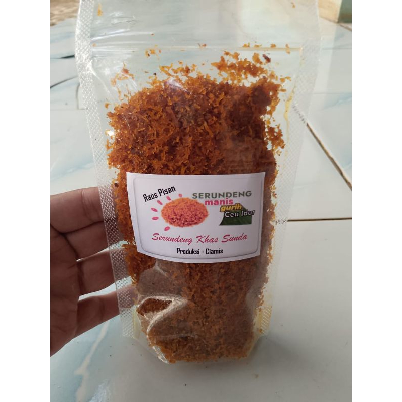 

Serundeng Kelapa Asli Kemasan 100Gr Rasa Pedas Manis Gurih Lauk Kering Halal Khas Jawa Barat