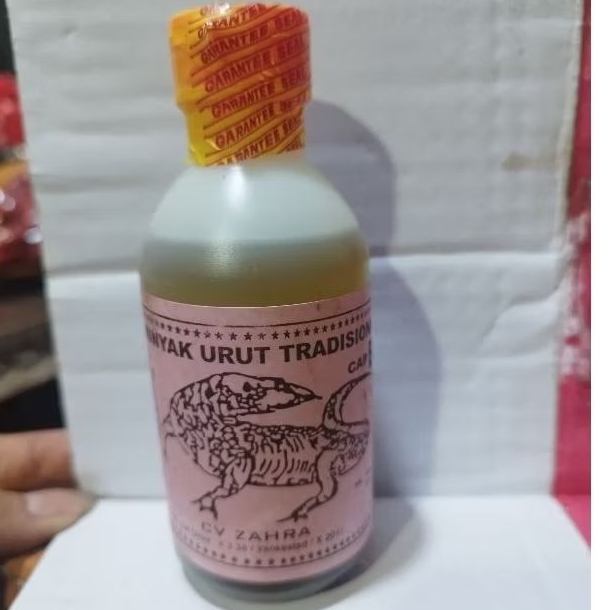 Minyak Urut Karo cap Biawak