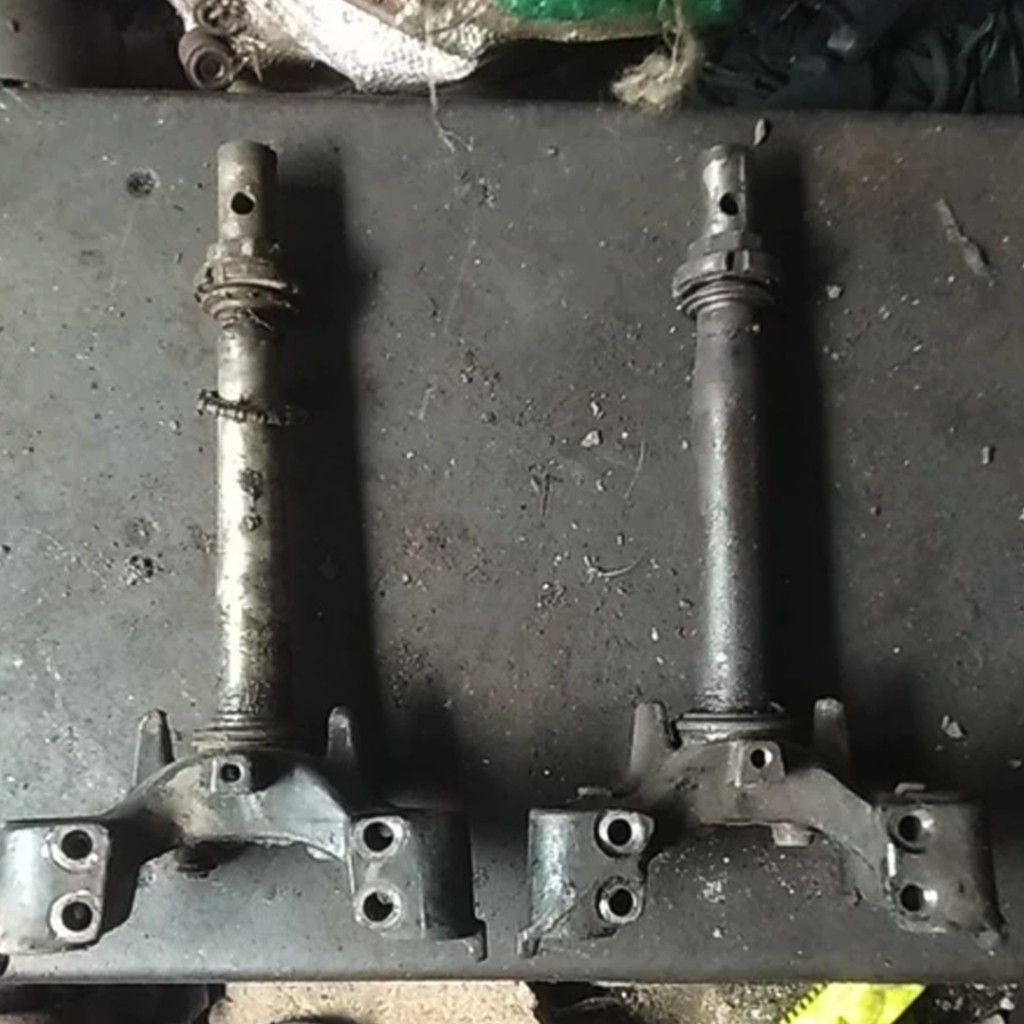 Segitiga T skok depan HONDA GRAND barang second original lepasan motor.