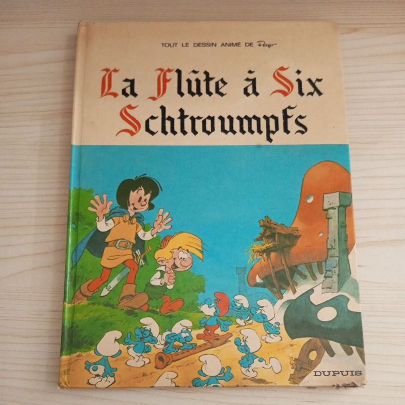 BUKU LA FLUTE A SIX SCHTEOUMPFS BY PEYO