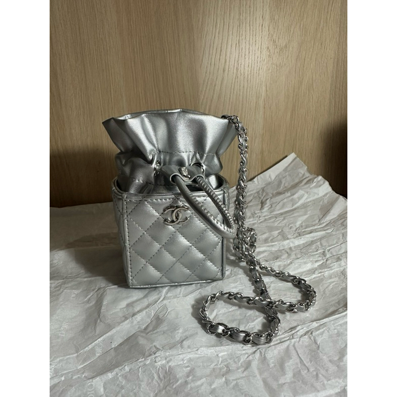 micro box bag in metalic silver with chanel box