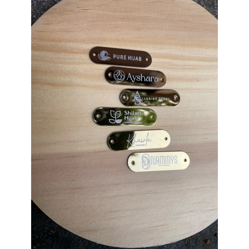 

label besi stenlees bahan anti karat label hijab label stanlees gamis label baju label brand