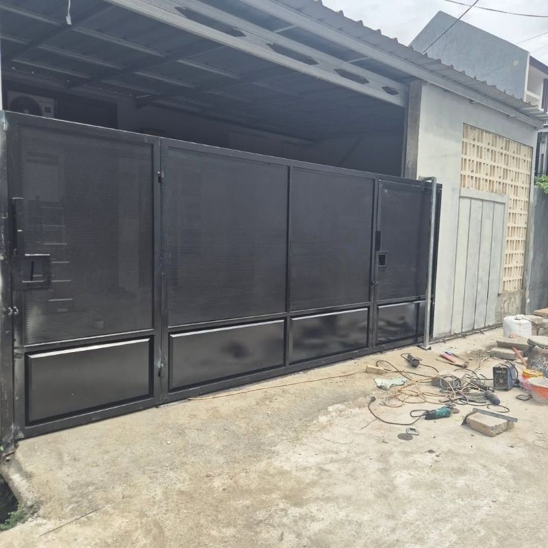 Pemasangan pagar rumah besi motif Plat Perforated kombinasi plat esser