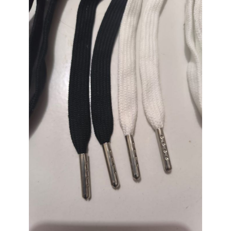 tali sepatu sekolah ujung besi