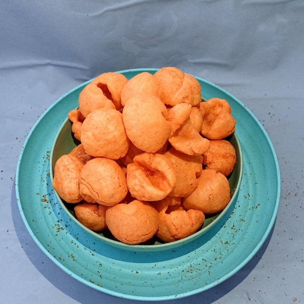 

Kerupuk Bentuk Keong Pedas 250 Gram – Gurih Renyah & Pedas Nikmat