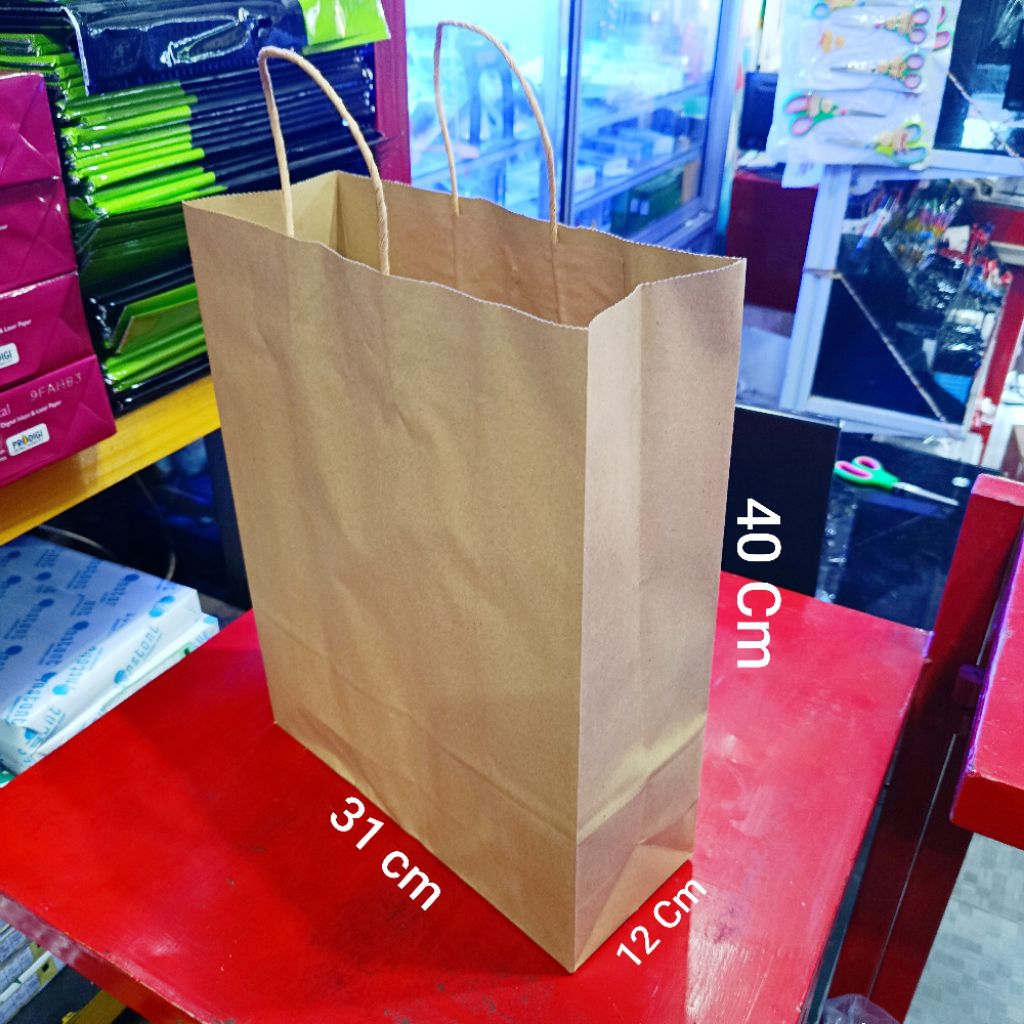 

Paper Bag Coklat Polos Kraft Sedang (27 x 10 x 34 Cm)