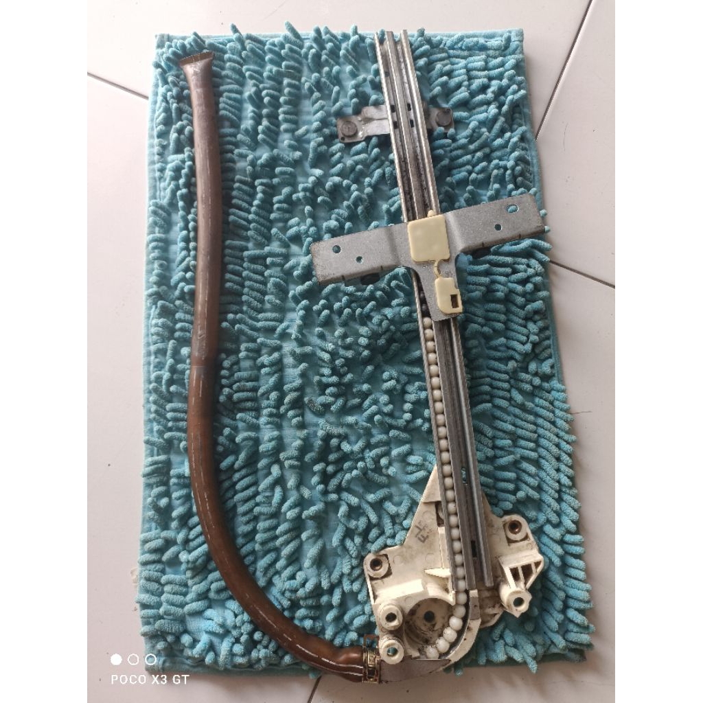 Regulator power window Mazda 626 Capella depan kiri ORIGINAL