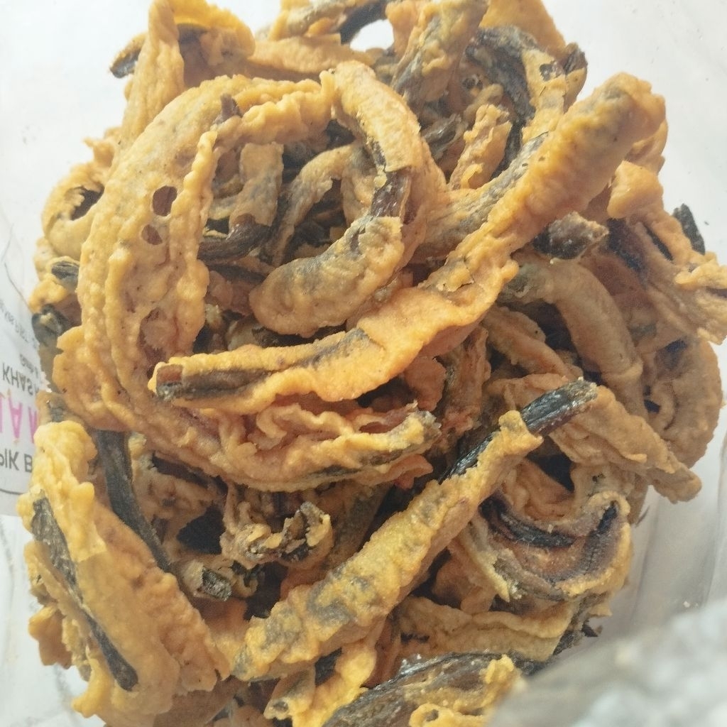 

Kripik Belut | Keripik Belut Gurih | Cemilan Gurih Kripik Belut Goreng Tepung | Aneka Cemilan dan Snack Kiloan Nyamikan Jogja