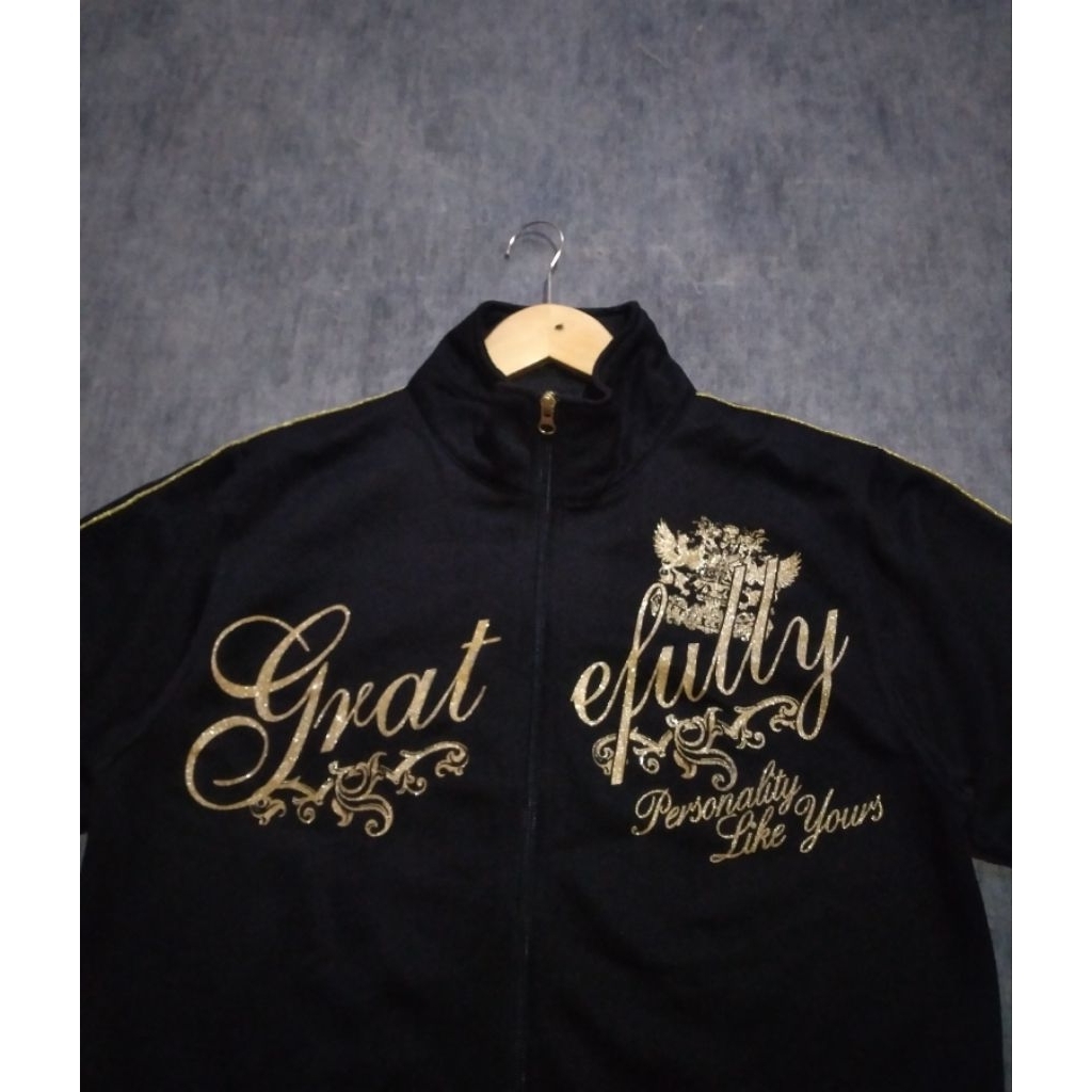 tracktop lengan pendek