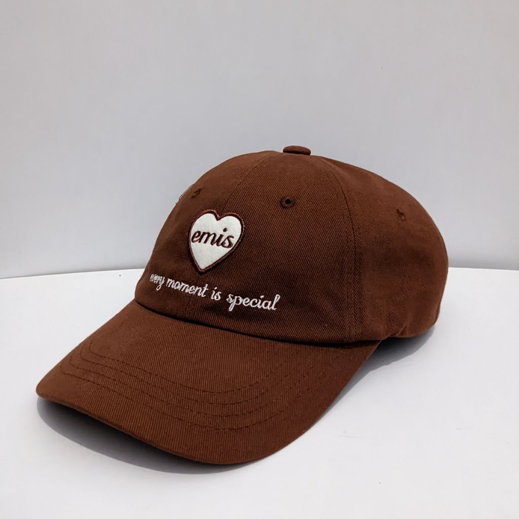 Topi Emis coklat
