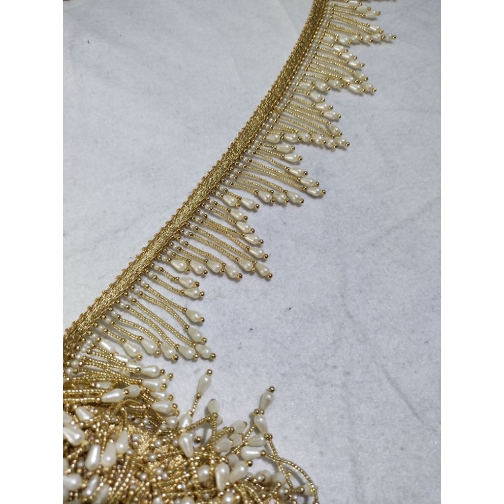 Renda rumbai India emas