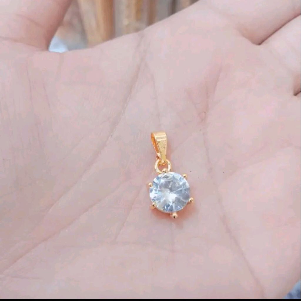 liontin mata satu titanium gold